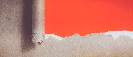 Rip red paper and white backgroundの写真素材