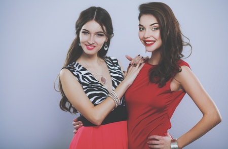 Two young beauty women standing together . Two young beauty womeの写真素材