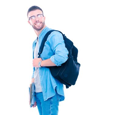 A male student with a school bag holding books isolated on white backgroundの写真素材