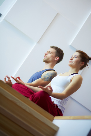 Face mask.Beautiful young girl at spa ,cosmetician woman applying facial mask.の写真素材