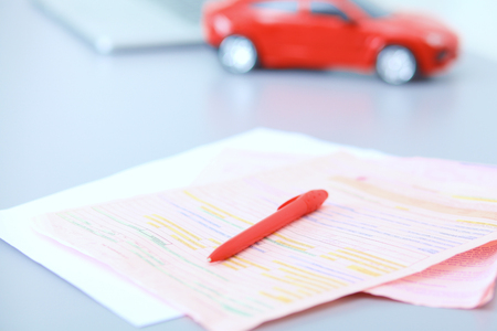 Portrait of female standing near open fridge full of healthy food, vegetables and fruits. Portrait of femaleの写真素材