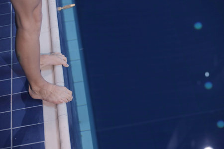 Male swimmer at the swimming pool. Underwater photo. Male swimmer.の写真素材