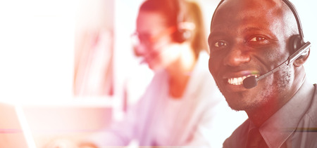 Business people working together at desk, white backgroundの写真素材