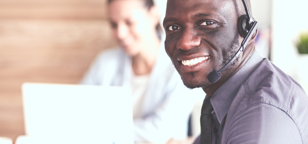 Portrait of an African American young business man with headset.の写真素材