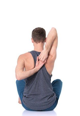 Young man practicing yoga. Yoga. Yoga Instructor