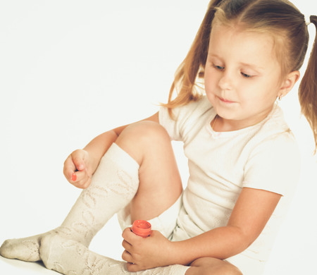 Child sitting on the floorの写真素材