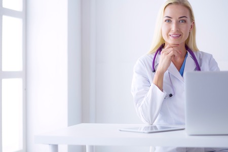 portrait of a young female doctor in a medical officeの写真素材