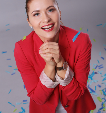 Portreit beautiful happy woman at celebration party with confetti .Birthday or New Year eve celebrating concept.の写真素材
