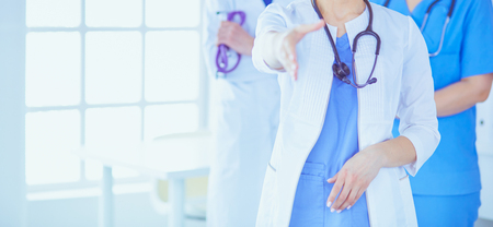 Female doctor offering a handshake in the hospitalの写真素材