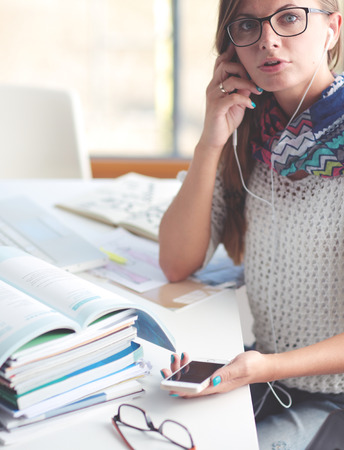 Woman use of mobile phone in university. Student. Universityの写真素材