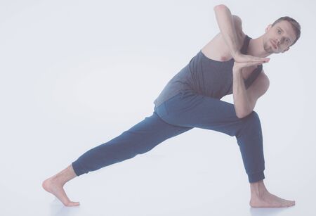 Young man practicing yoga. Yoga. Yoga Instructorの写真素材