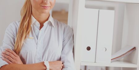 Modern business woman standing in the officeの写真素材
