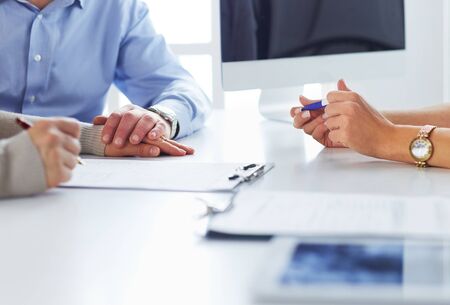 close up of patient and doctor prescribing medicationの写真素材