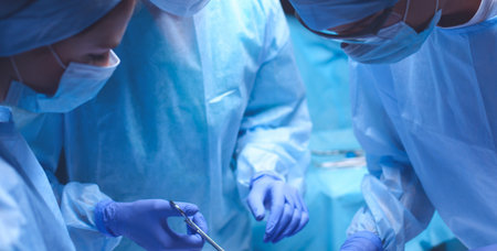 Team surgeon at work in operating room