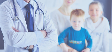 Little children with her mother at a doctor on consultation
