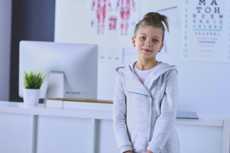 Portrait of a cute little girl at hospitalの写真素材