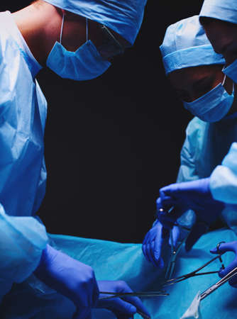 Team surgeon at work in operatingの写真素材