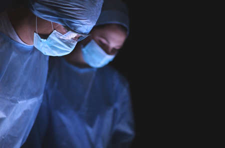 Team surgeon at work in operatingの写真素材