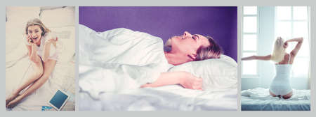 Relaxed young woman sitting on bed with a cup of coffee and digital tabletの写真素材