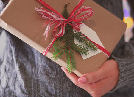 Hands of woman holding christmas gift box. Christmas