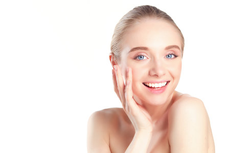 Portrait of beautiful woman with natural make up on white backgroundの写真素材