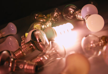 White light bulb glowing among the others.の写真素材