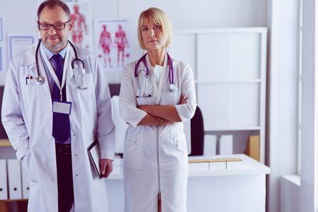 Portrait of group of smiling hospital colleagues standing togetherの写真素材