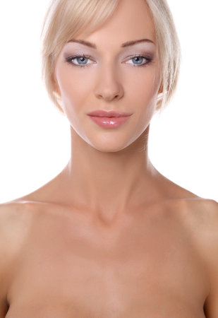 Close up portrait of beautiful young woman face. Isolated on white background.の写真素材