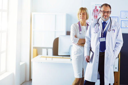 Portrait of group of smiling hospital colleagues standing togetherの写真素材