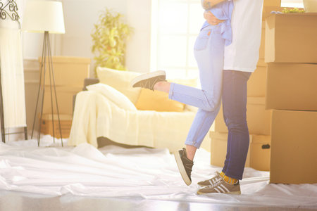 Portrait of happy couple in new homeの写真素材