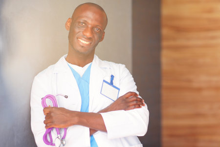 Doctor with arms folded in modern office. Doctorの写真素材