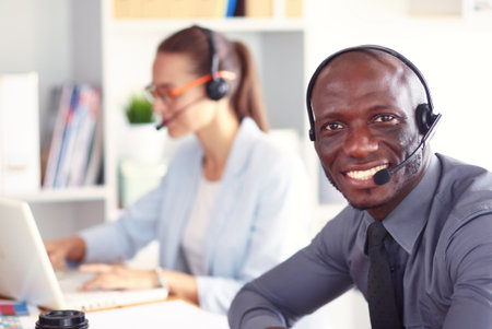 Portrait of an African American young business man with headset.の写真素材