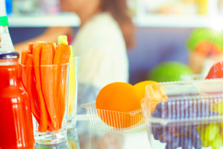Open refrigerator with fresh fruits and vegetable. Open refrigeratorの写真素材