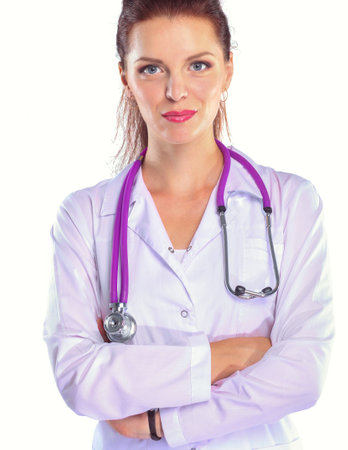 Portrait of young woman doctor with white coat standing in hospital . Portrait of young woman doctorの写真素材