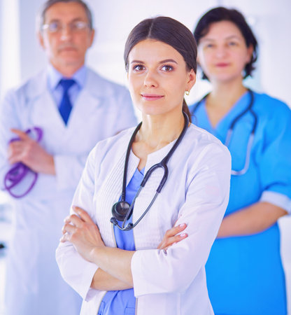 Group of doctors and nurses standing in the hospital Accident and Emergency departmentの写真素材