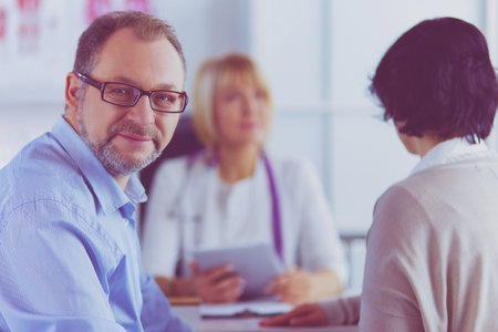 Smiling medical doctor and patient. Health careの写真素材