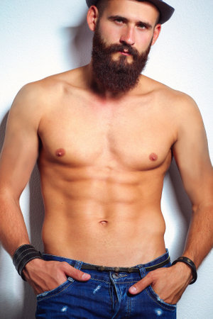 Portrait of handsome bearded man isolated on grey backgroundの写真素材