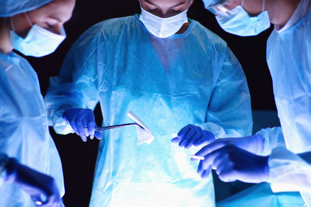 Team surgeon at work in operatingの写真素材