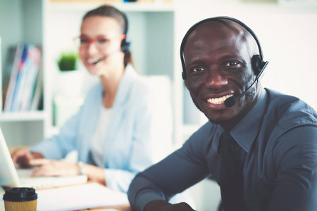 Portrait of an African American young business man with headset.の写真素材