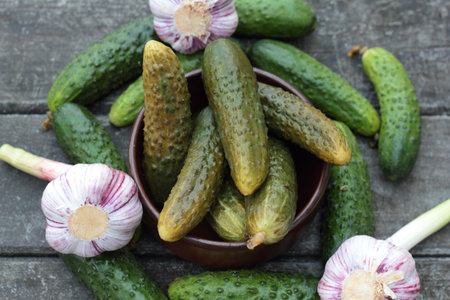 Closeup of some pickled and fresh cucumbers.の写真素材