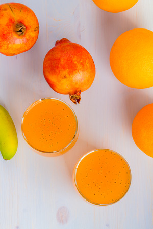 Glass of orange and basil seeds drink.の写真素材