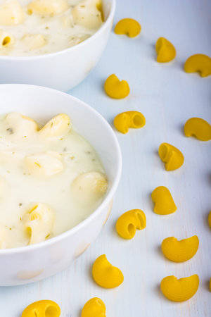 Thick and creamy chicken soup with noodles.