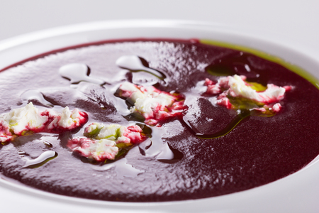 Beetroot soup with gorgonzola and olive oil.の写真素材