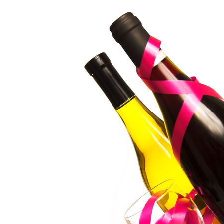 Wine Bottles, Glass and Ribbons on a Plain White Backgroundの写真素材