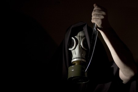 creepy masked man with knifeの写真素材