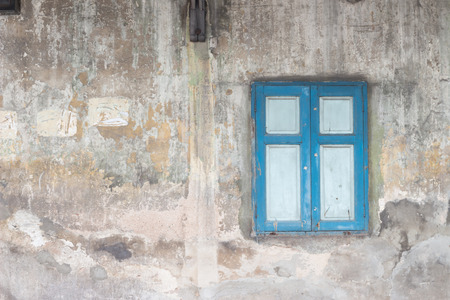 Sky Blue Window on the Old Dirty Wallの写真素材