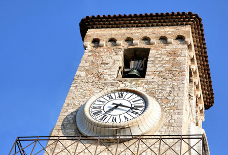 Bell tower of Church Notre Dame clock Cannes France