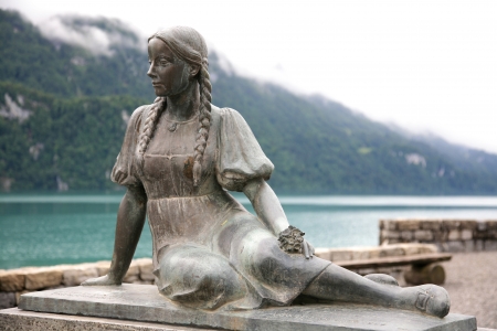 Sculpture of girl with flowers. Lake Brienz, Switzerland.の写真素材