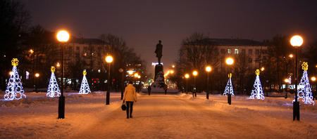 Nizhny Novgorod, Russia - December 16, 2014:  Ð¡entral Gorky square decorated light Christmas trees before the New Year and Merry Christmas. Many people like to walk here.のeditorial素材