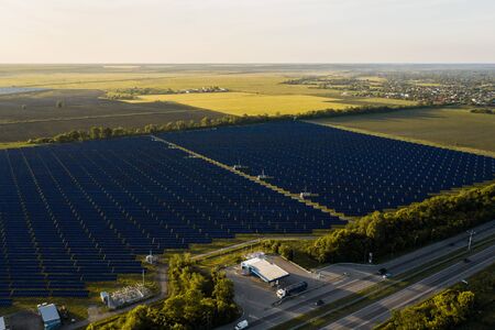 Aerial top view of a solar panels power plant. Modern technology, climate care, earth saving, renewable energy anti global warming conceptの写真素材
